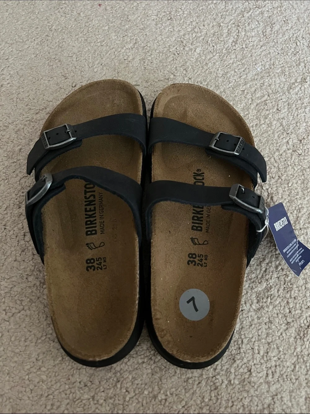 Birkenstock women’s black striped sandals